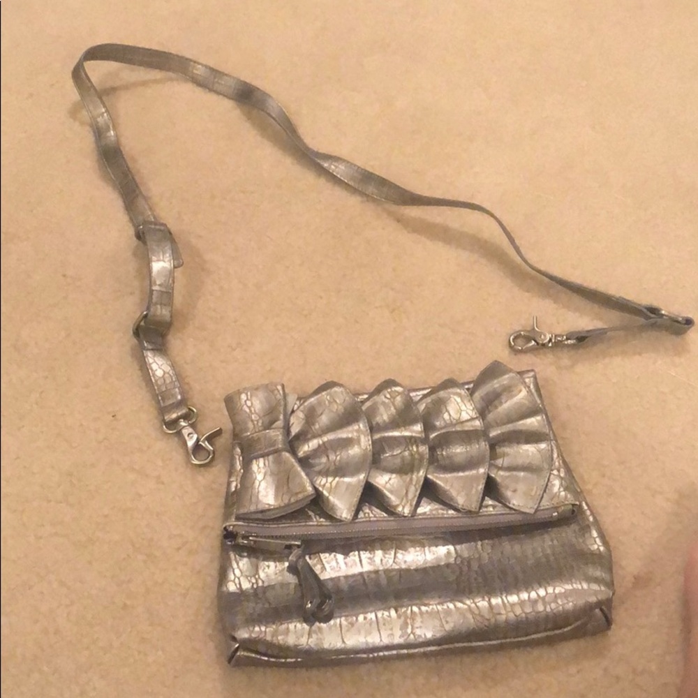 Clutch or across the body purse. (Never been used)